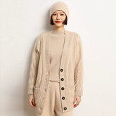 Maglione ritorto cardigan in cashmere oversize con bottoni a trecce